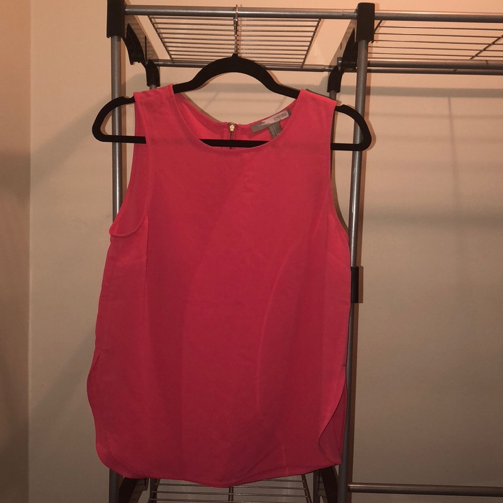 Hot pink blouse with side slits and zipper detail